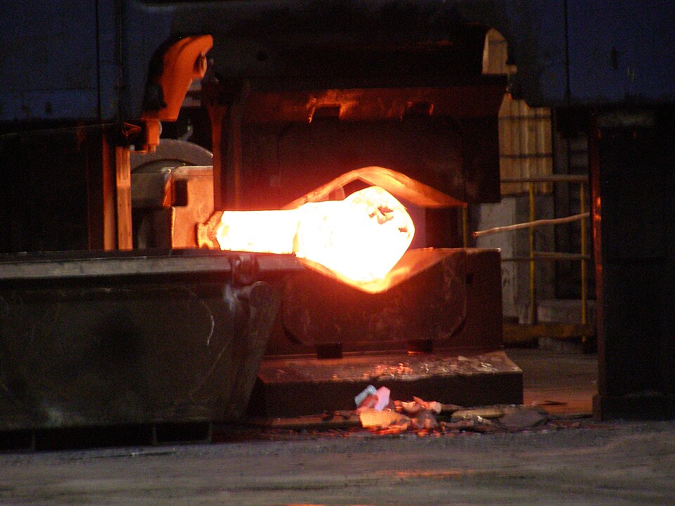 Steel glowing at an elevated normalizing temperature